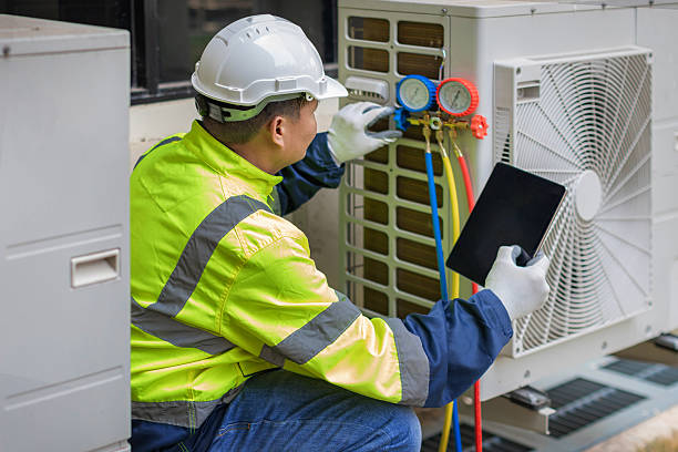 Professional Heat Pump Repair technician working in Hunt Valley, MD